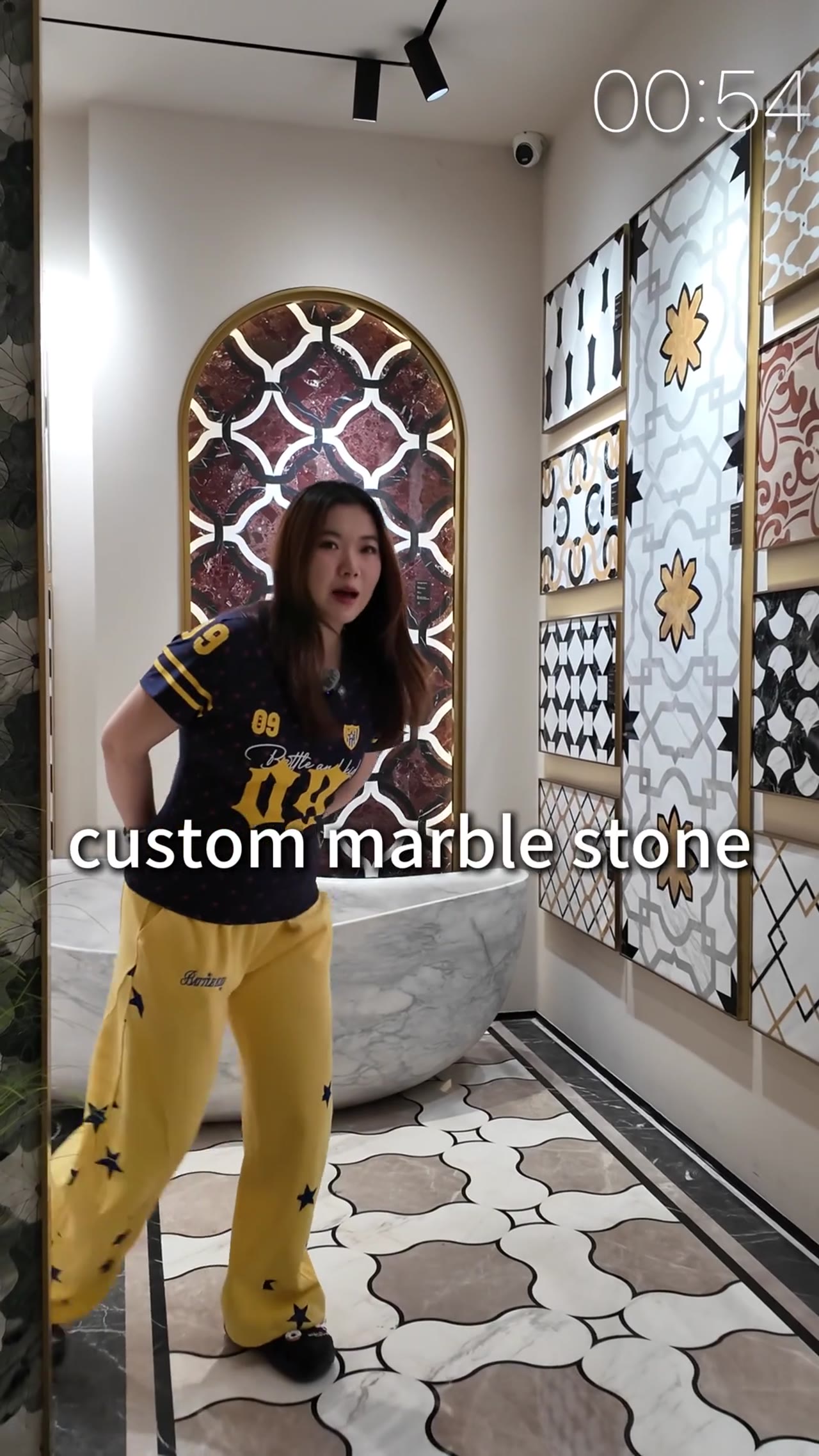 Woman presenting furniture in modern showroom