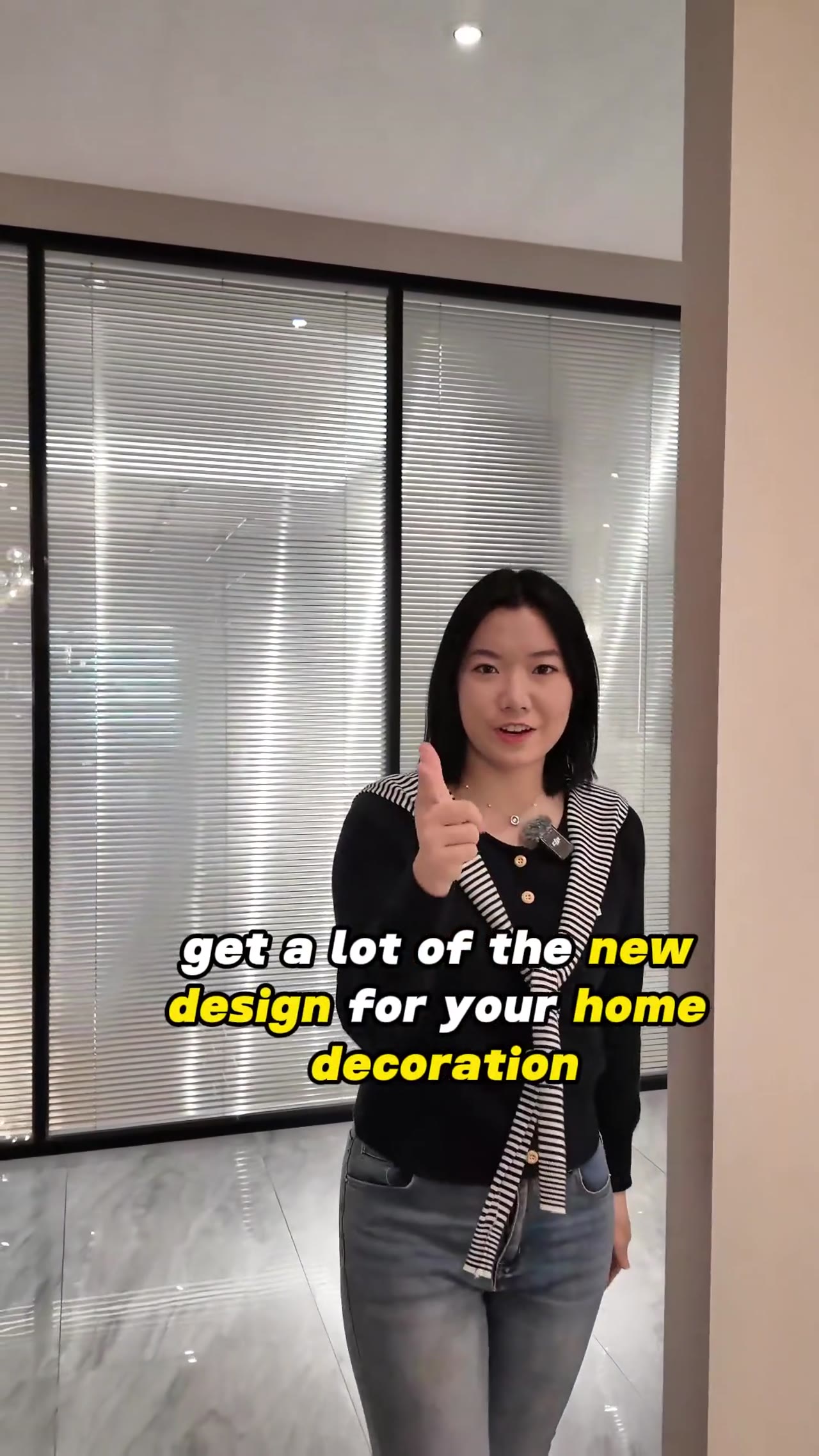 Woman interacts with modern kitchen cabinet highlighting wine cooler